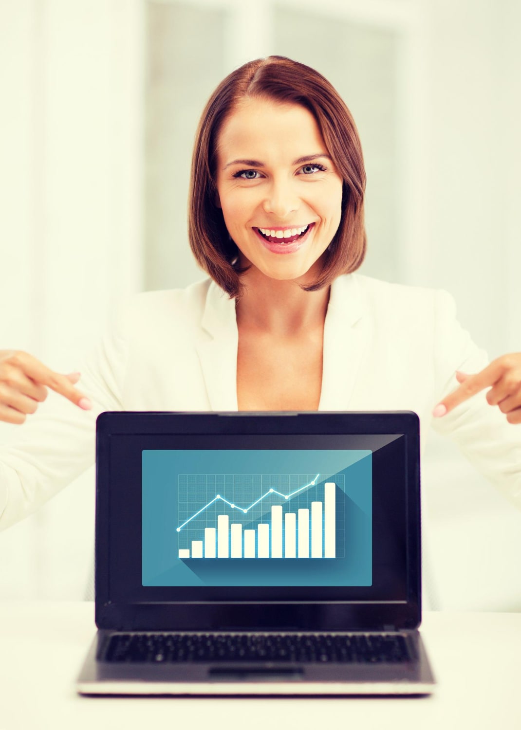 business-concept-businesswoman-showing-laptop-with-graph-min