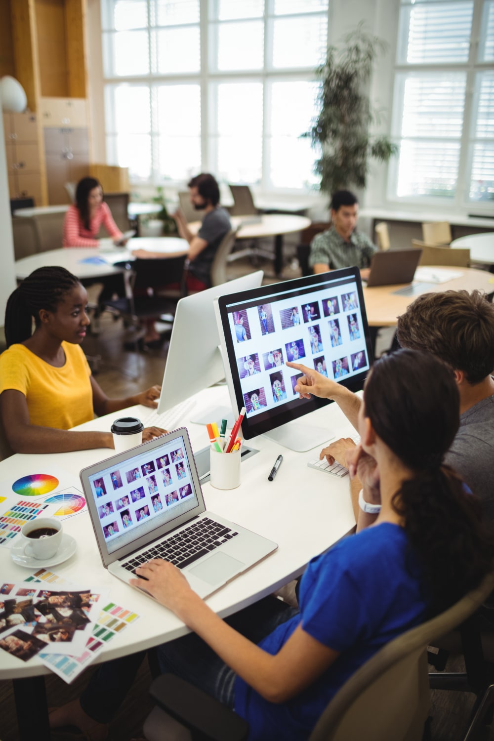 graphic-designers-working-their-desk-min