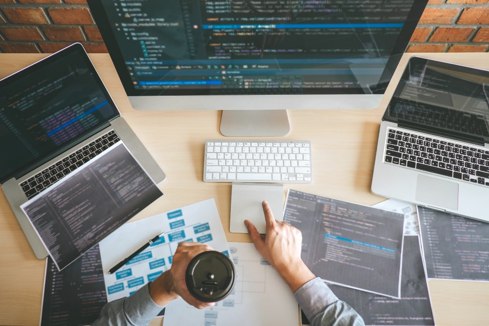 professional-developer-programmer-working-software-website-design-coding-technology-writing-codes-database-company-office-global-cyber-connection-technology (1)-min