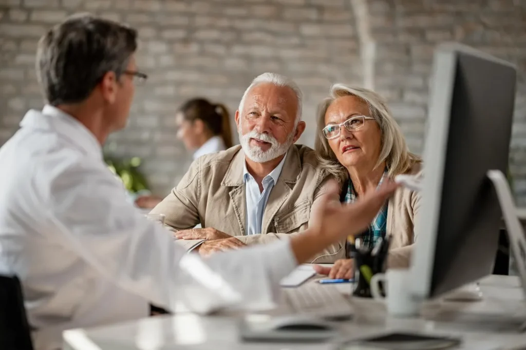 Adult child researching senior care communities online for a parent